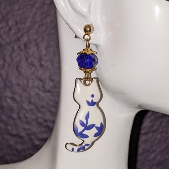 3/$10 Cobalt Blue Floral Cat Earrings - Picture 1 of 10